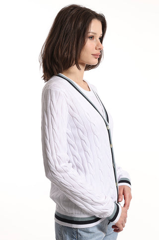 White cable knit cardigan with blue and black stripes on the hem side view